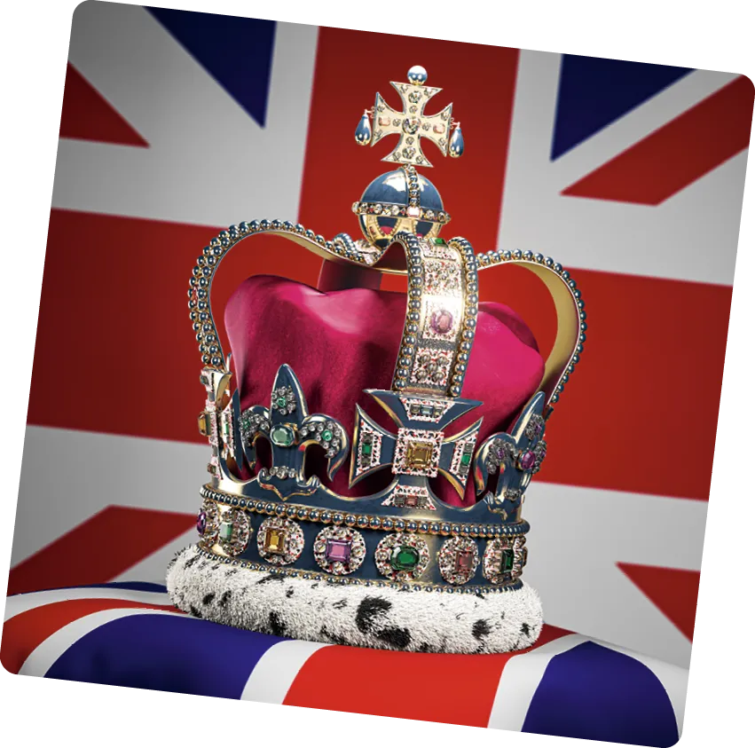couronne royale posée sur un coussin avec le drapeau britannique en fond