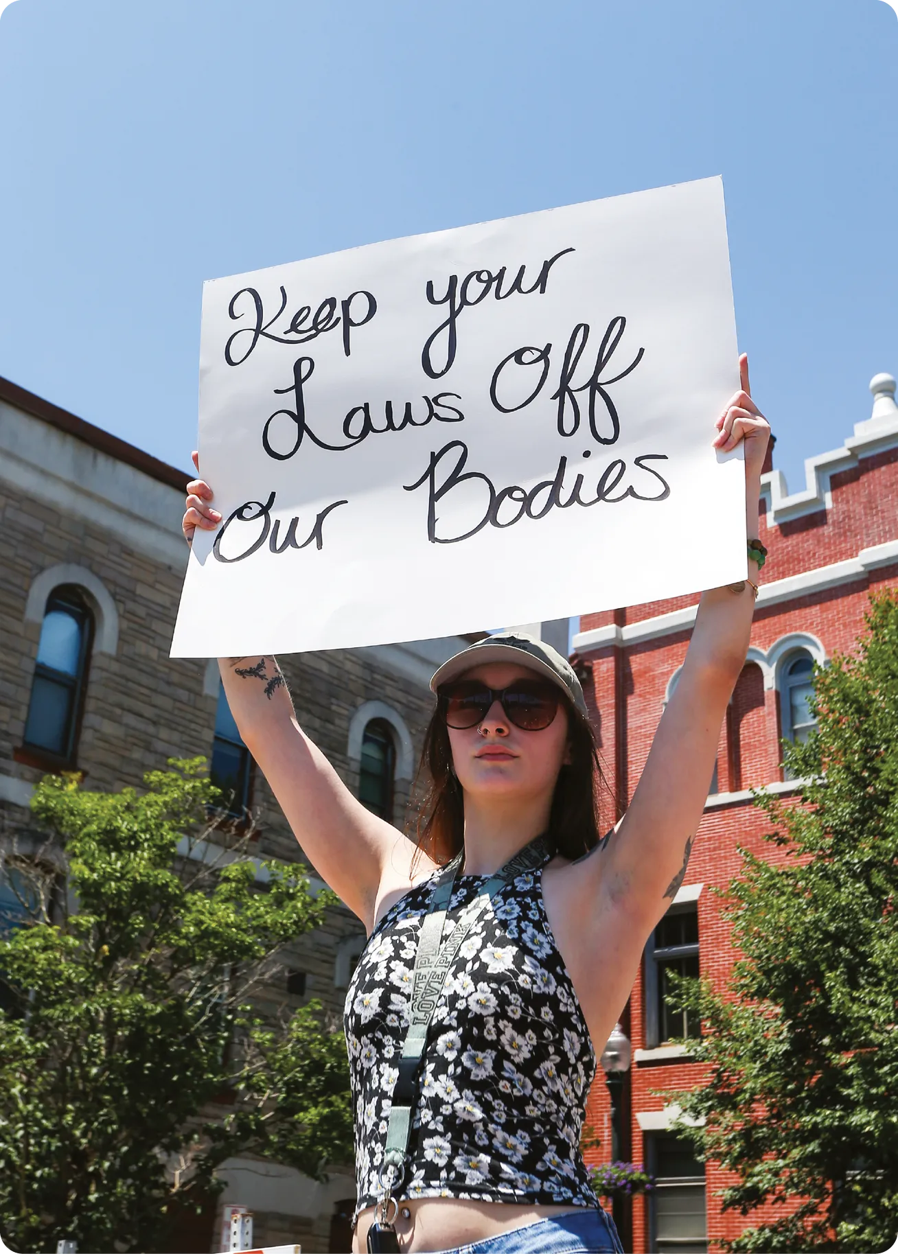 During an abortion rights rally in Bloomsburg, Pennsylvania, a woman holds a placard in support of reproductive freedom, 2022.