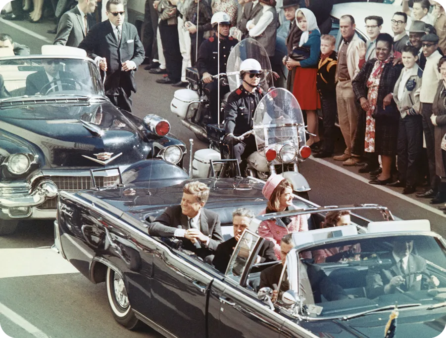 Kennedys Riding in Dallas Motorcade.