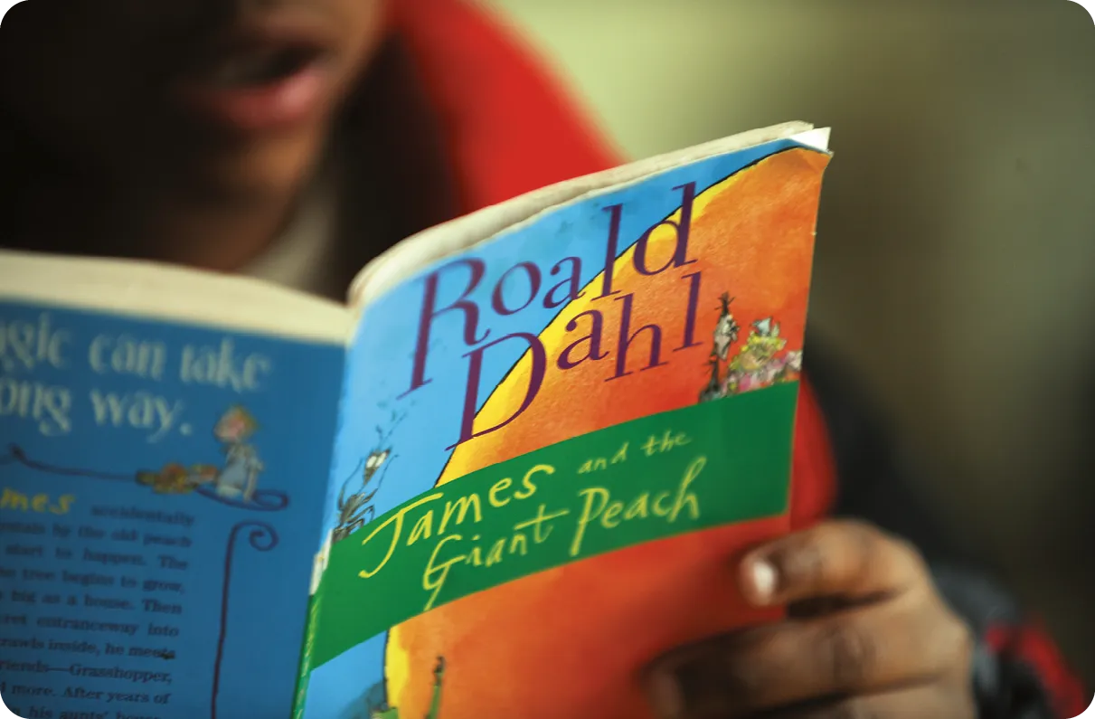 Kirkland & Ellis employees reading to the kids of Everybody Wins!