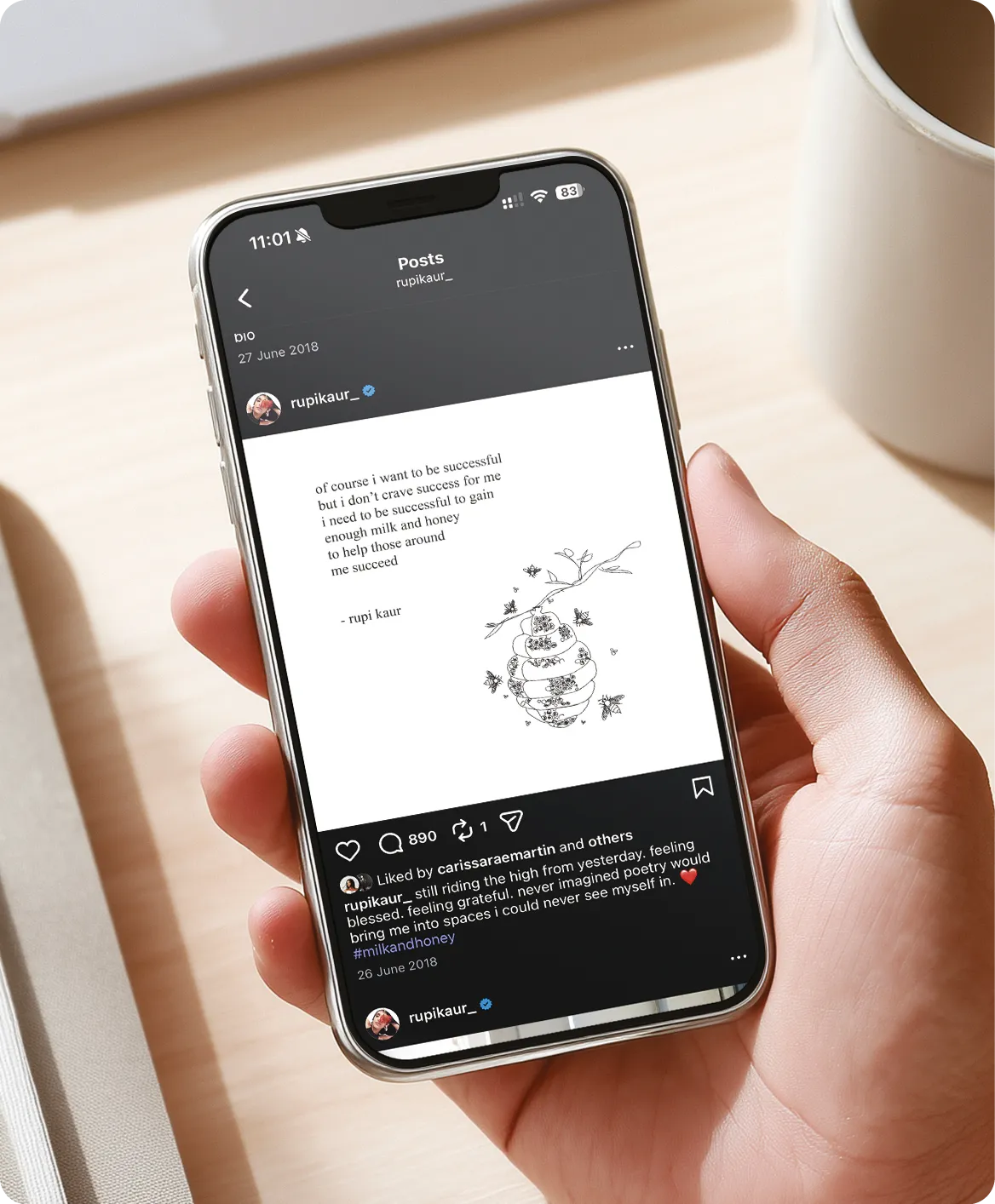 Smartphone screen mockup of hand holding mobile phone on office desk.