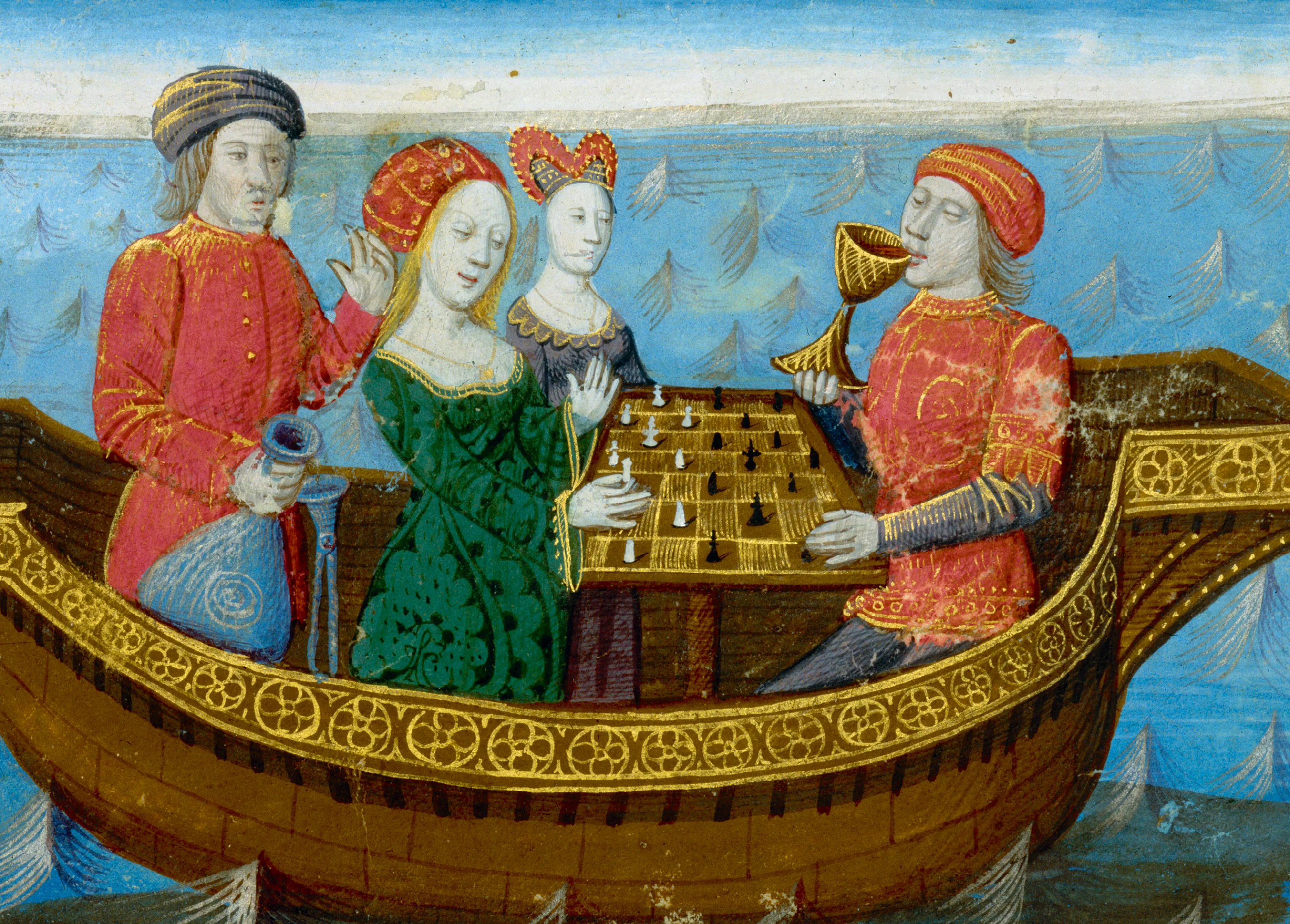 Miniature médiévale : Tristan et Iseut jouent aux échecs et boivent un philtre d'amour sur un bateau.