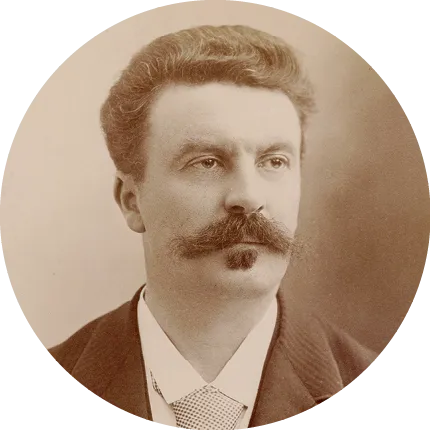 Photographie de Guy de Maupassant par Nadar (vers 1888), écrivain français, portrait en buste, vêtu d'une veste foncée.