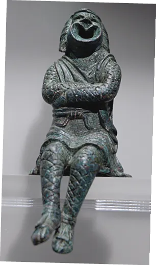 Acteur dans le rôle d'un esclave, statuette en bronze, début du IIIe siècle.