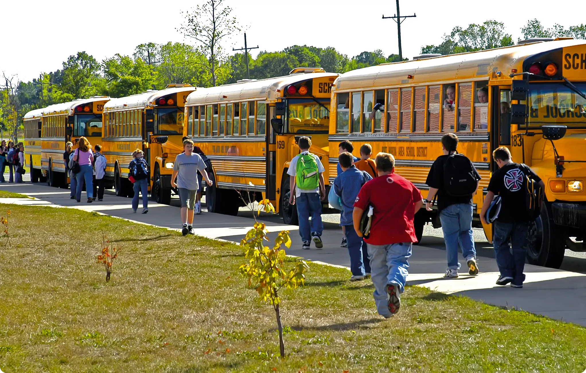 Kids around the school bus