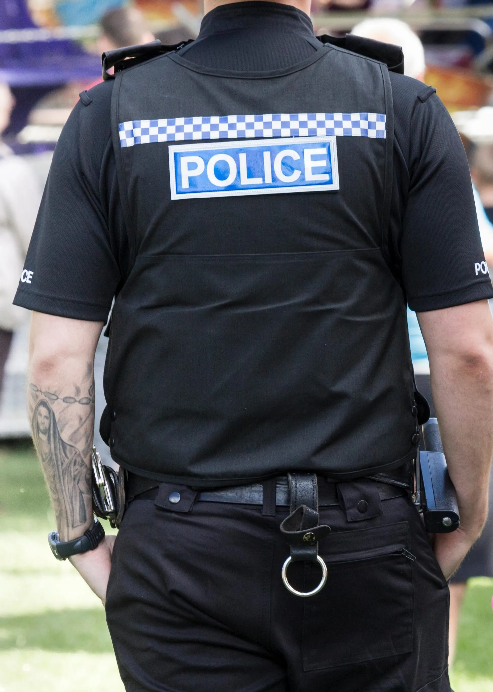 A tattooed policeman in UK, 2016.