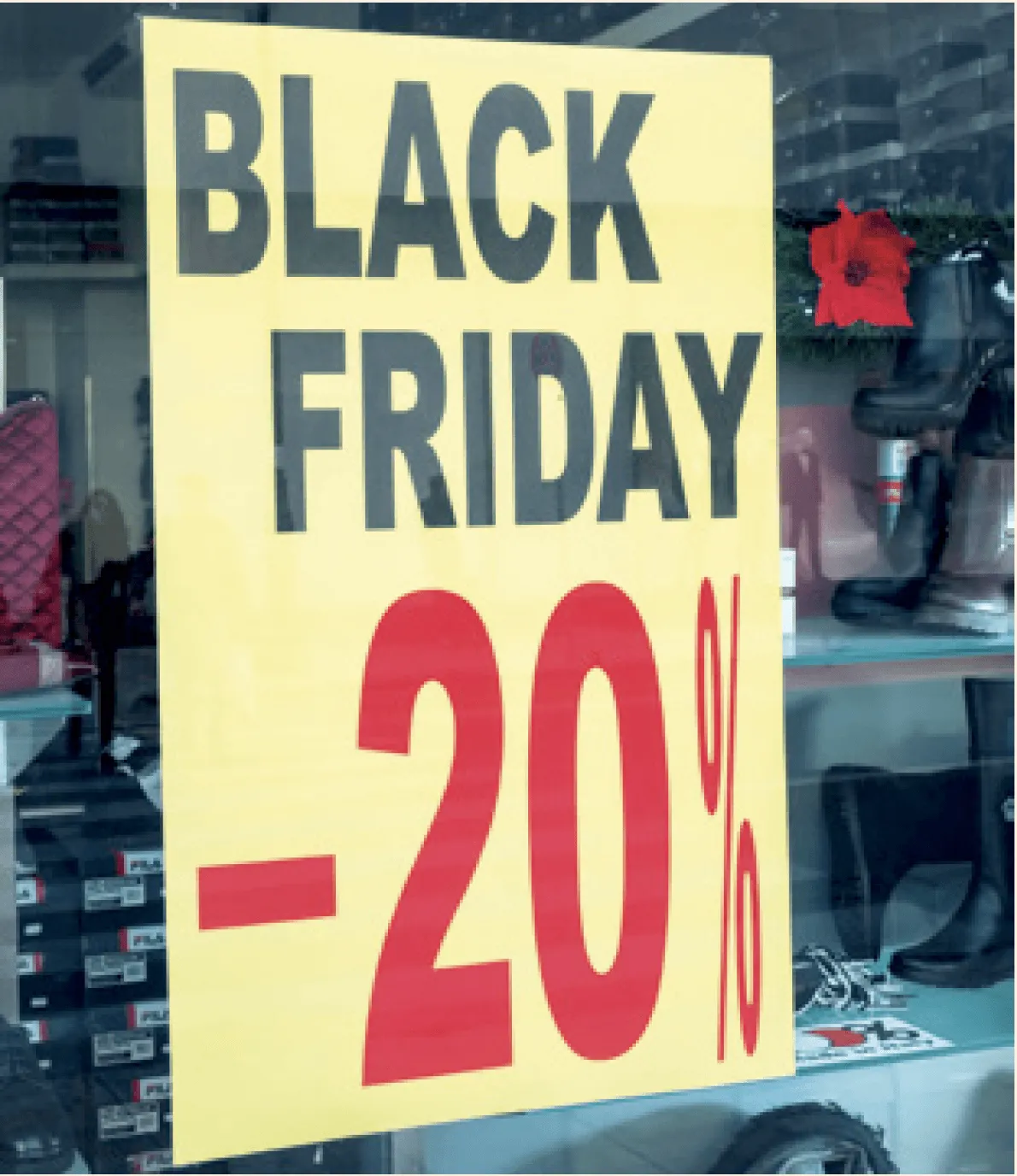 Photographie d'une affiche Black Friday annonçant 20% de réduction.