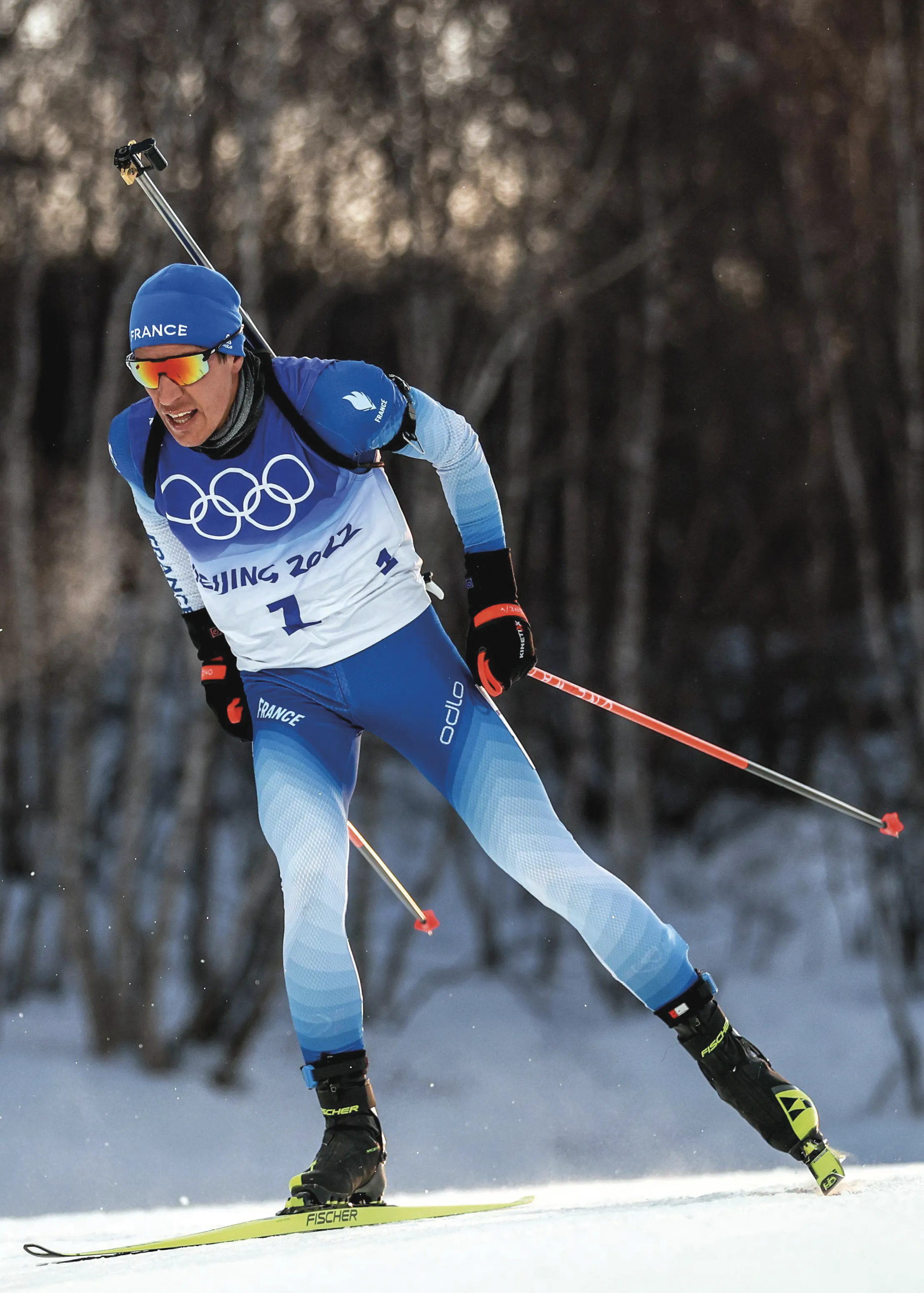 biathlète olympique français en train de concourire aux JO d'hiver de Beijing 2022