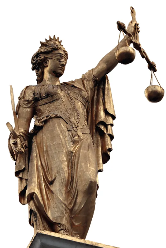 Statue dorée de la Justice, les yeux bandés, tenant une balance et une épée.