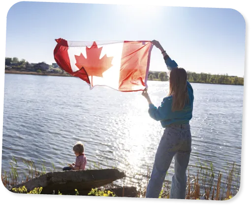 Woman holding a canadian flag.