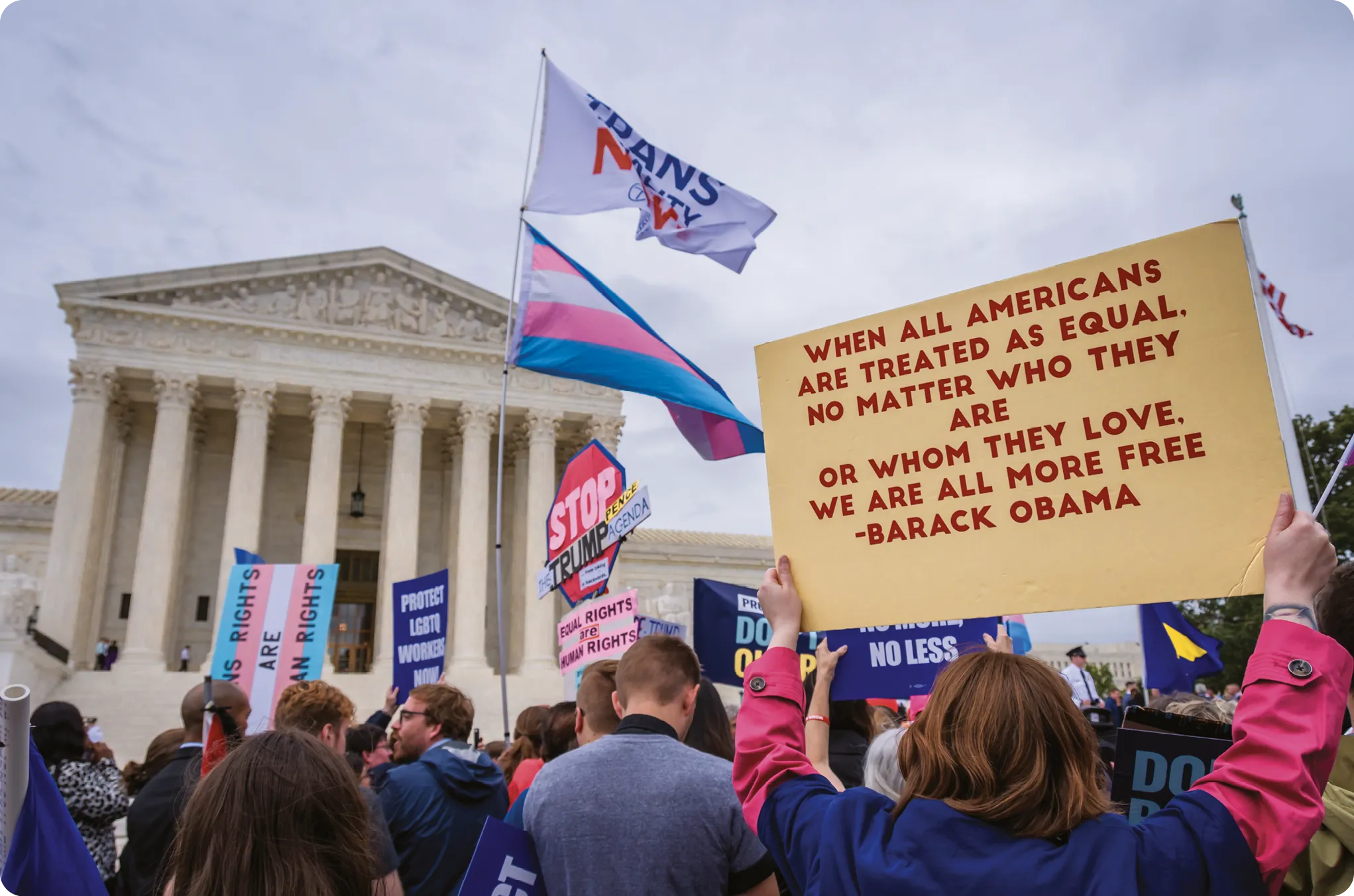 Participants holding signs outside the the Supreme Court, 2019.