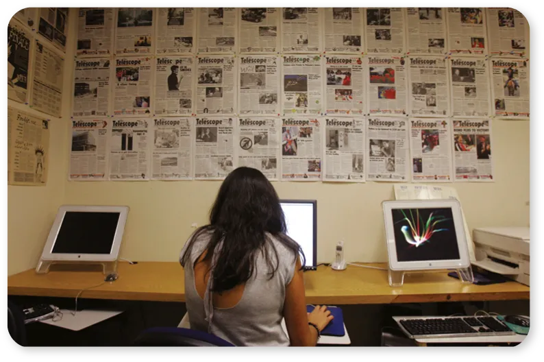 Shahrazad Encinias, a reporter, works on a story. 