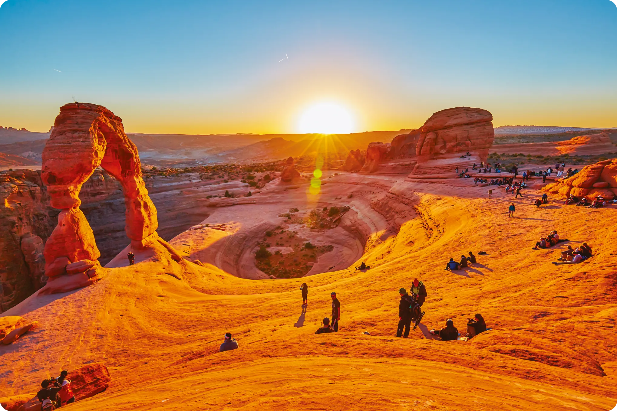 The sunset crowd at Delicate Arch, Arches National Park, Utah.