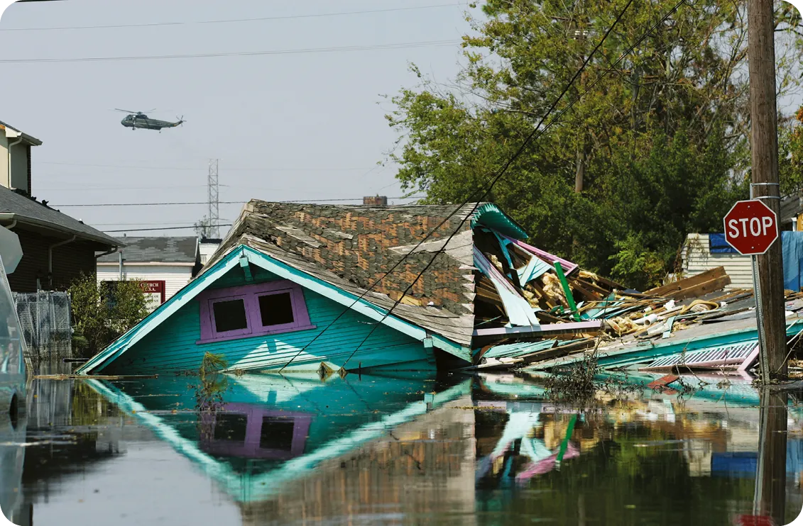 Remains of a house in the flooded Ninth Ward neighborhood
of New Orleans after Hurricane Katrina, September 2005.
