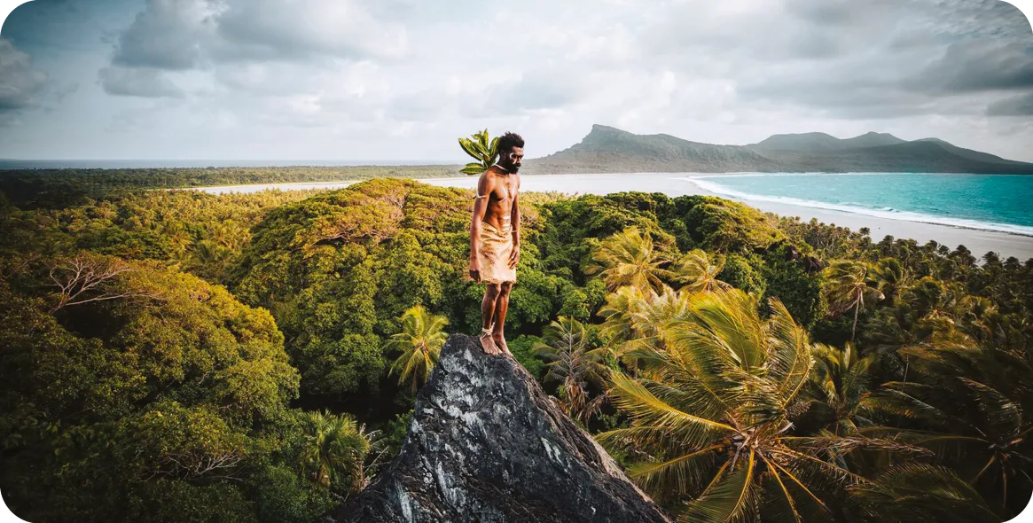 A Vanuatu man stands on top of the Rock of Ra, Banks Islands, Vanuatu.